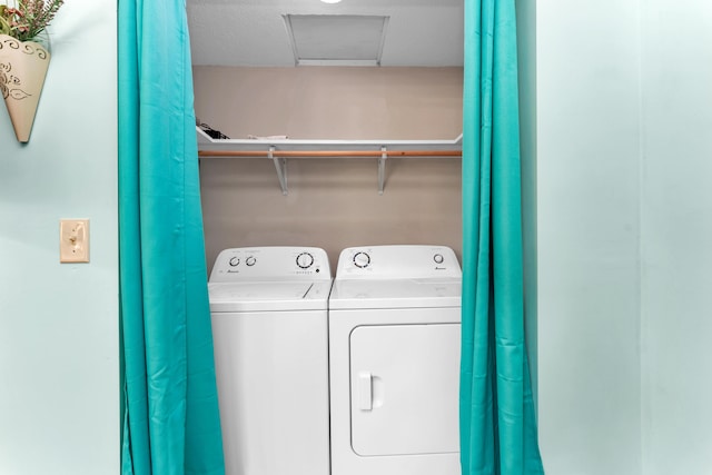 301 Lake Dr, Branson, MO 65616 - laundry room with separate washer and dryer and attic access