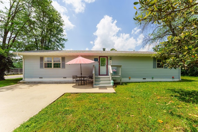 301 Lake Dr, Branson, MO 65616 - rear view of house with crawl space, a yard, a patio, and entry steps