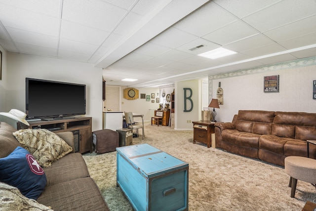 1163 S Gregg Rd, Nixa, MO 65714 - carpeted living room with a drop ceiling and baseboards