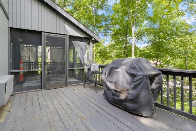 91 Moongate Dr, Osage Beach, MO 65065 - wooden deck with a sunroom and area for grilling