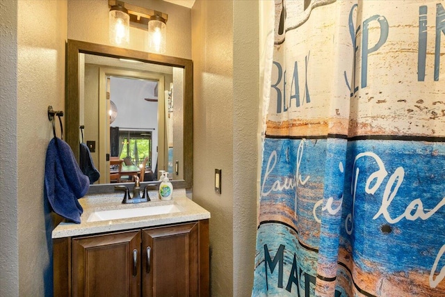 91 Moongate Dr, Osage Beach, MO 65065 - bathroom featuring a textured wall and vanity