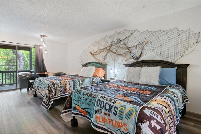 91 Moongate Dr, Osage Beach, MO 65065 - bedroom with wood finished floors, access to exterior, and a textured ceiling