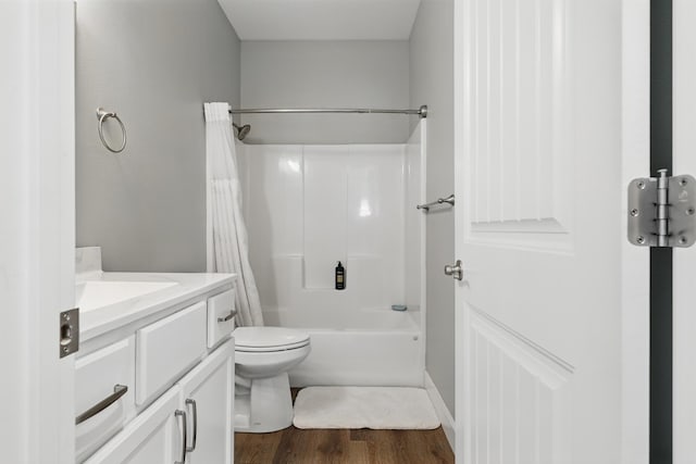 233 Siena Blvd, Branson, MO 65616 - bathroom with wood finished floors, vanity, toilet, shower / bath combo, and baseboards