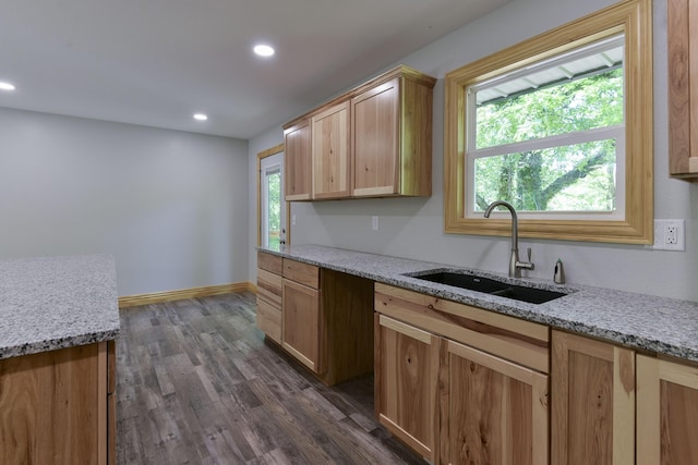 25173 Farm Rd Unit 1266, Shell Knob, MO 65747 - kitchen with a sink, dark wood-style flooring, recessed lighting, light stone counters, and baseboards