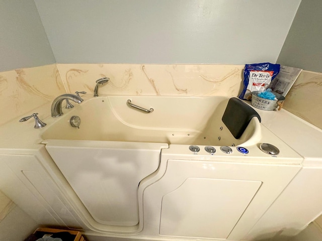 5312 S Hawthorne Dr, Springfield, MO 65804 - full bathroom with a whirlpool tub