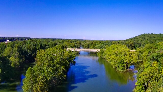5312 S Hawthorne Dr, Springfield, MO 65804 - aerial view of a forest, a notable bridge, and a nearby body of water