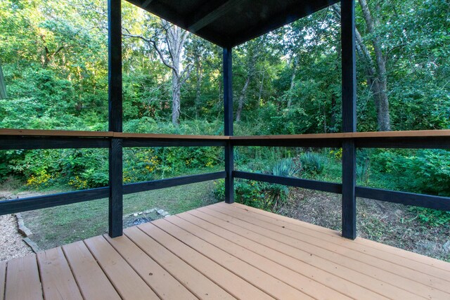 5312 S Hawthorne Dr, Springfield, MO 65804 - wooden deck with a wooded view