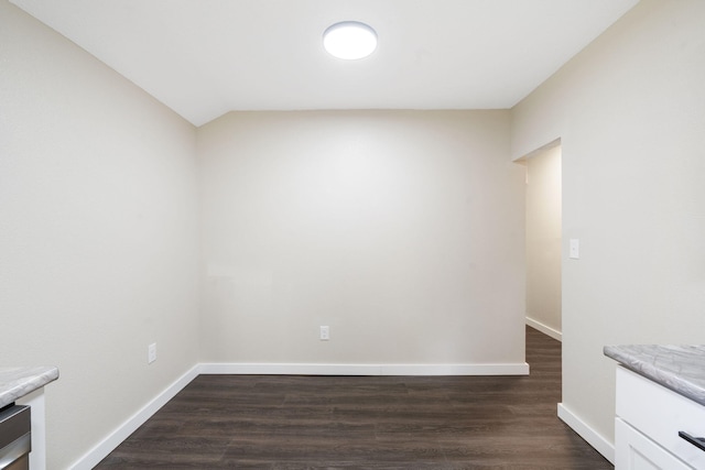 1827 N Tyler Ave, Springfield, MO 65802 - spare room featuring dark wood finished floors and baseboards