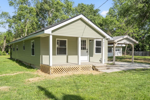 1827 N Tyler Ave, Springfield, MO 65802 - view of front of house with covered porch and a carport