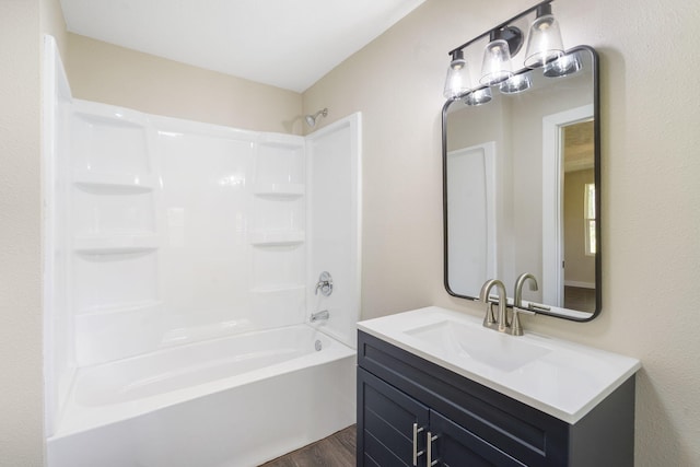 1827 N Tyler Ave, Springfield, MO 65802 - bathroom with wood finished floors, shower / tub combination, and vanity