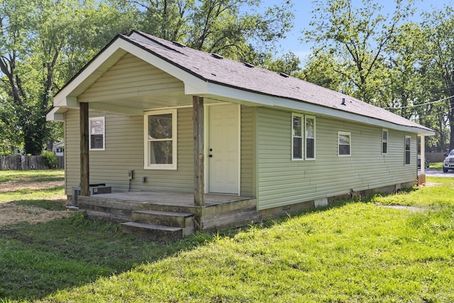1827 N Tyler Ave, Springfield, MO 65802 - view of front facade with crawl space and roof with shingles