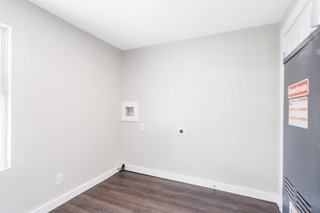 1827 N Tyler Ave, Springfield, MO 65802 - spare room with baseboards and dark wood-type flooring