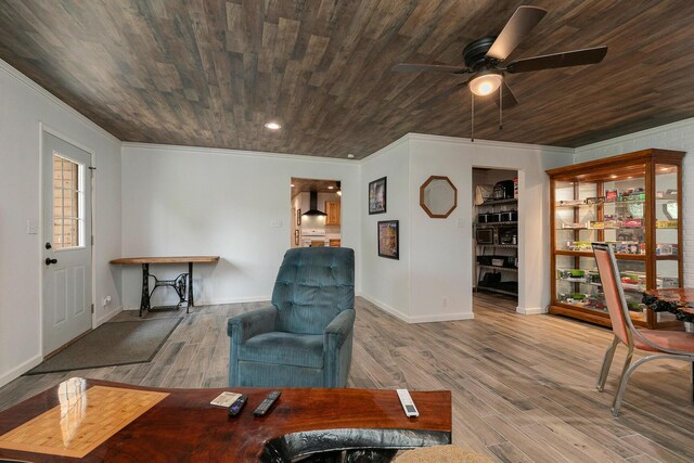 296 Lodgepole Dr, Ozark, MO 65721 - living room with ornamental molding, wood finished floors, ceiling fan, wooden ceiling, and baseboards