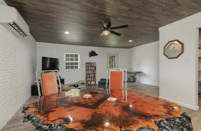 296 Lodgepole Dr, Ozark, MO 65721 - dining space featuring ceiling fan, wood finished floors, a wall mounted air conditioner, brick wall, and wooden ceiling