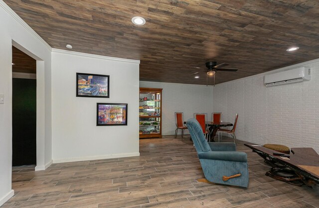 296 Lodgepole Dr, Ozark, MO 65721 - dining room with a wall unit AC, a ceiling fan, wooden ceiling, wood finished floors, and brick wall