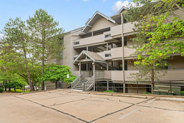 13 Treehouse Ln Unit 4, Branson, MO 65616 - view of property featuring uncovered parking