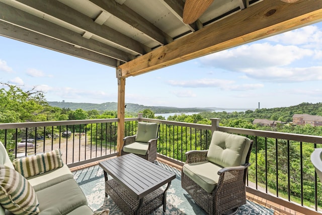 13 Treehouse Ln Unit 4, Branson, MO 65616 - balcony with an outdoor living space and a water view