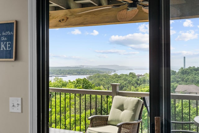 13 Treehouse Ln Unit 4, Branson, MO 65616 - balcony with a water view and ceiling fan