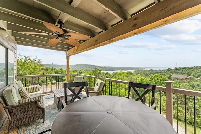 13 Treehouse Ln Unit 4, Branson, MO 65616 - balcony featuring ceiling fan, outdoor dining space, and a deck with water view