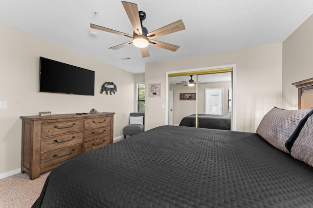 13 Treehouse Ln Unit 4, Branson, MO 65616 - bedroom with a ceiling fan, light carpet, baseboards, and a closet