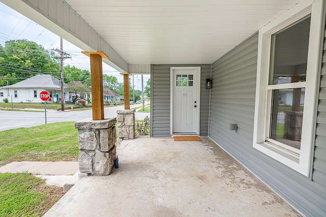 1223 W State St, Springfield, MO 65806 - doorway to property with covered porch