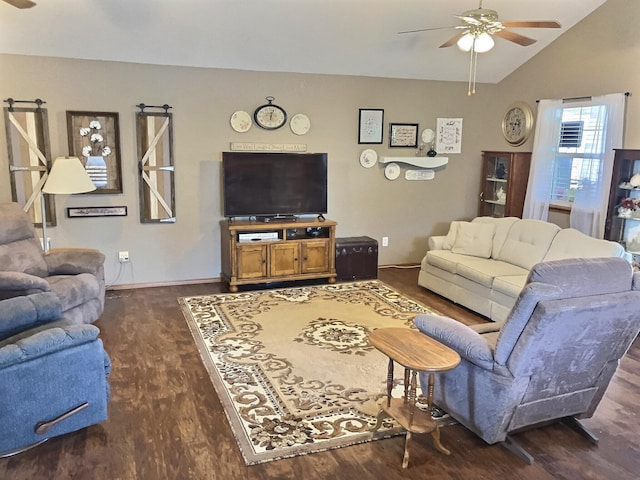 1810 Meadows Dr, Neosho, MO 64850 - living area featuring a ceiling fan, dark wood-style flooring, and vaulted ceiling