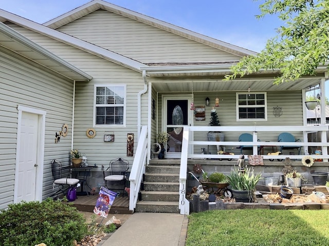 1810 Meadows Dr, Neosho, MO 64850 - doorway to property featuring a porch