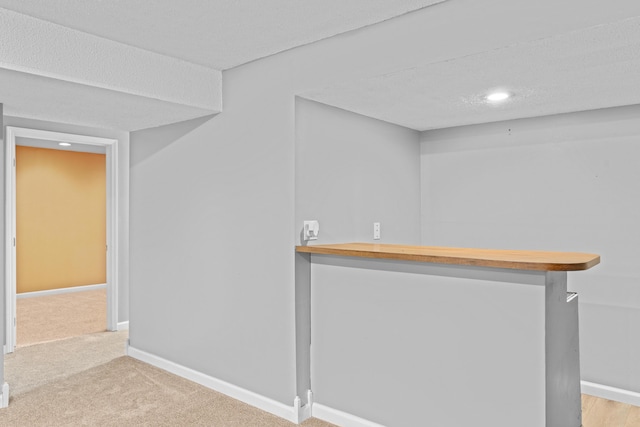 4824 S Gold Rd, Battlefield, MO 65619 - bar area featuring baseboards, carpet floors, a textured ceiling, and recessed lighting