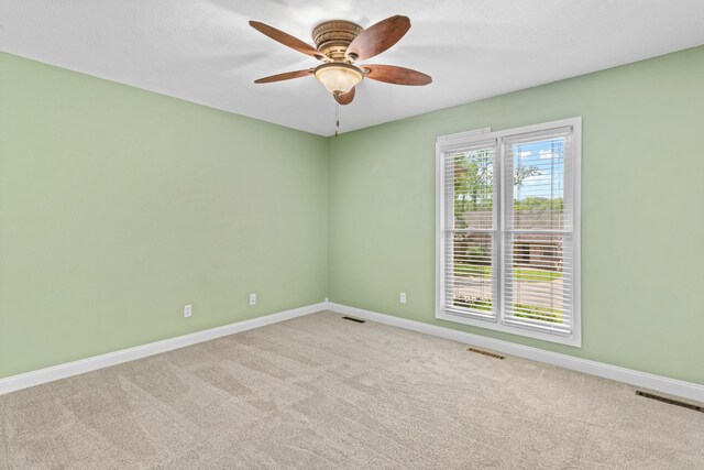 4824 S Gold Rd, Battlefield, MO 65619 - carpeted spare room featuring a ceiling fan and baseboards