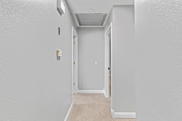 4824 S Gold Rd, Battlefield, MO 65619 - corridor with baseboards, light colored carpet, and a textured wall