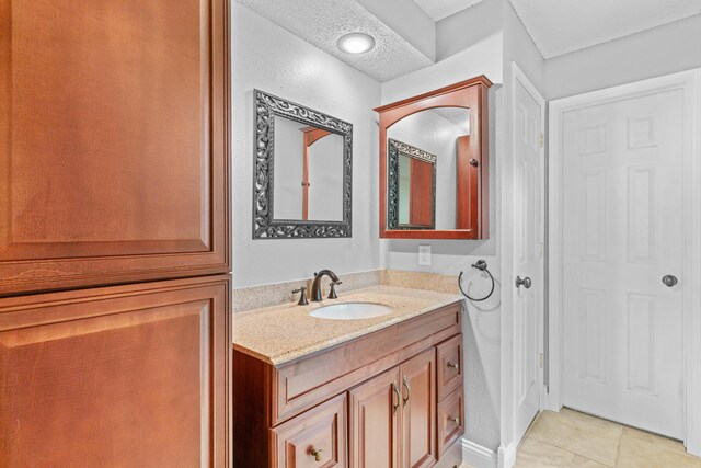 4824 S Gold Rd, Battlefield, MO 65619 - bathroom featuring tile patterned floors and vanity