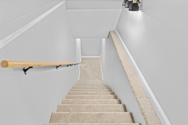 4824 S Gold Rd, Battlefield, MO 65619 - stairway featuring a textured wall