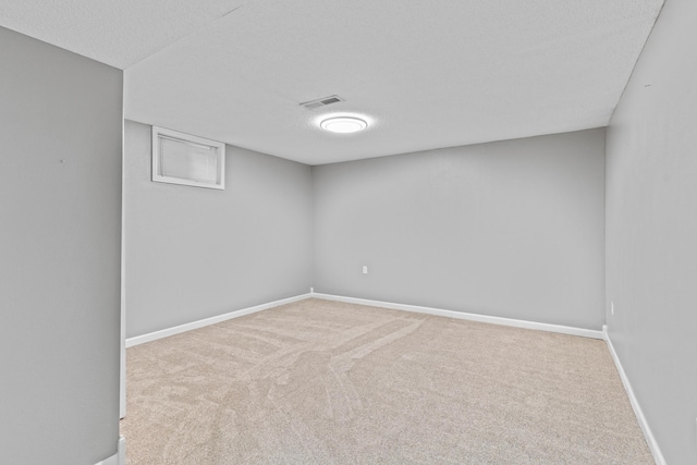 4824 S Gold Rd, Battlefield, MO 65619 - finished basement featuring carpet, baseboards, and a textured ceiling