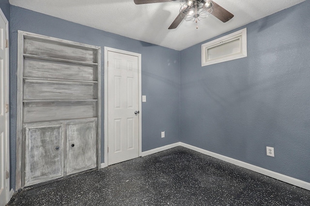 2418 E Catalpa St, Springfield, MO 65804 - unfurnished bedroom with baseboards and ceiling fan