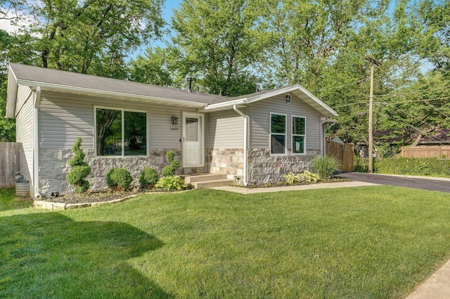2418 E Catalpa St, Springfield, MO 65804 - view of front of property featuring stone siding and driveway