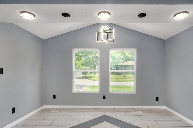 2418 E Catalpa St, Springfield, MO 65804 - empty room with vaulted ceiling and baseboards