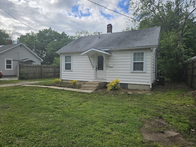 1629 W Webster St, Springfield, MO 65802 - bungalow featuring a chimney, central AC unit, and roof with shingles