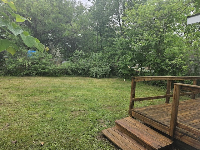 1629 W Webster St, Springfield, MO 65802 - view of green lawn with a wooden deck
