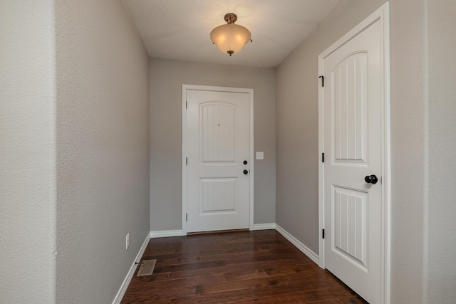 1918 N Brook Hollow Dr, Nixa, MO 65714 - entryway with dark wood finished floors and baseboards