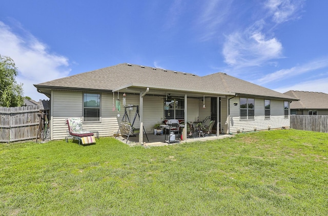 1918 N Brook Hollow Dr, Nixa, MO 65714 - back of property with a patio area and a shingled roof