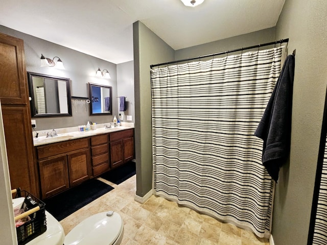 1620 Jon St, West Plains, MO 65775 - full bathroom featuring toilet, double vanity, baseboards, and a shower with shower curtain