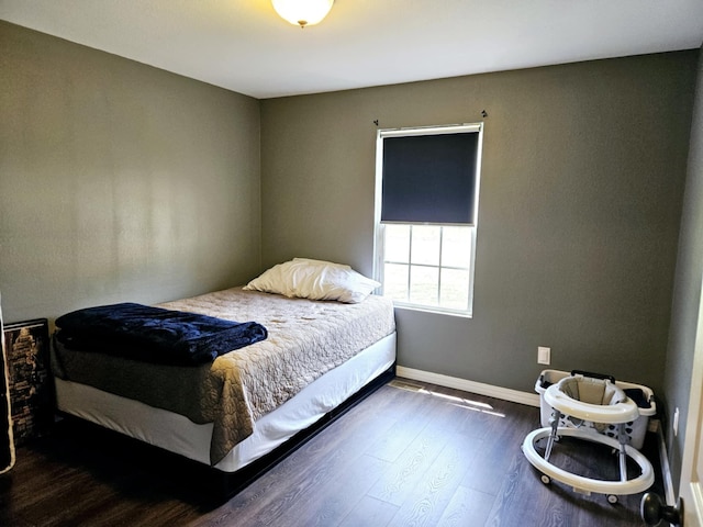 1620 Jon St, West Plains, MO 65775 - bedroom featuring wood finished floors and baseboards
