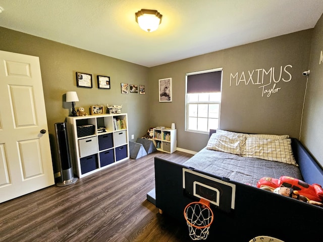 1620 Jon St, West Plains, MO 65775 - bedroom with dark wood-type flooring and baseboards