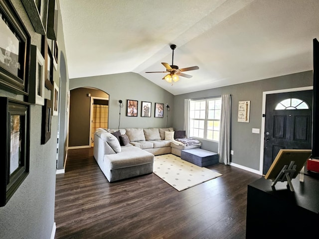1620 Jon St, West Plains, MO 65775 - living room with arched walkways, ceiling fan, dark wood finished floors, lofted ceiling, and baseboards