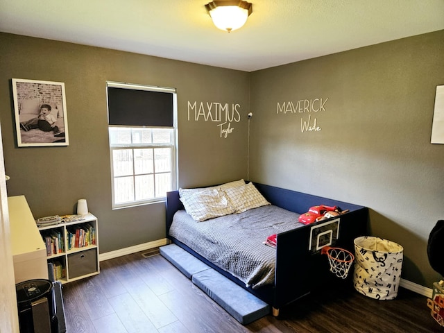 1620 Jon St, West Plains, MO 65775 - bedroom with wood finished floors and baseboards