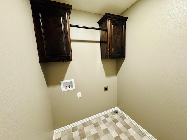4692 S 125th Rd, Bolivar, MO 65613 - laundry area with hookup for an electric dryer, cabinet space, washer hookup, and baseboards