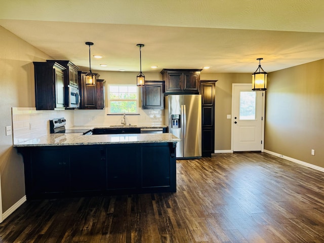 4692 S 125th Rd, Bolivar, MO 65613 - kitchen with stainless steel appliances, a sink, baseboards, dark wood-style flooring, and recessed lighting