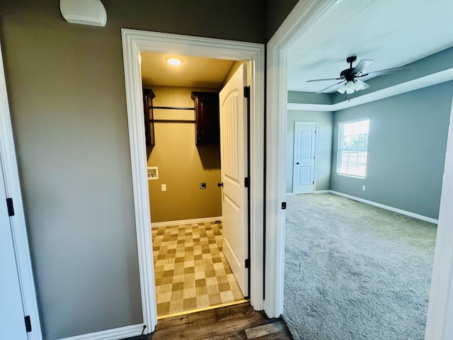 4692 S 125th Rd, Bolivar, MO 65613 - corridor with baseboards and dark colored carpet