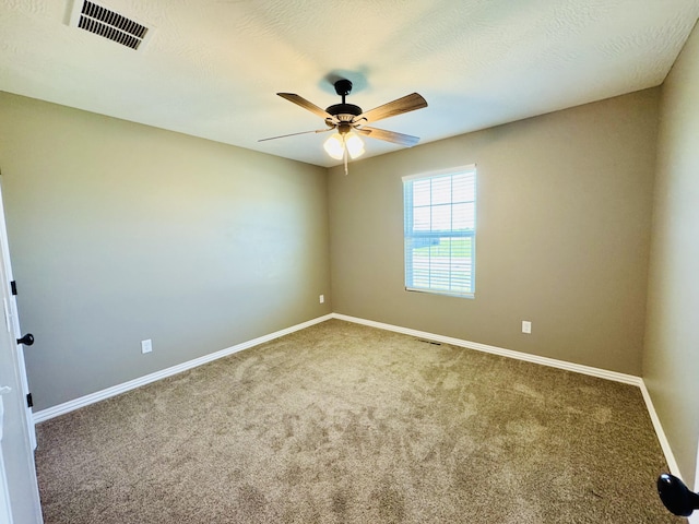 4692 S 125th Rd, Bolivar, MO 65613 - empty room with carpet flooring, baseboards, and a ceiling fan