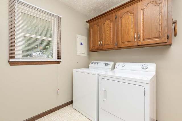 3729 S Parklane Ave, Springfield, MO 65807 - washroom featuring separate washer and dryer, cabinet space, baseboards, electric panel, and a textured ceiling